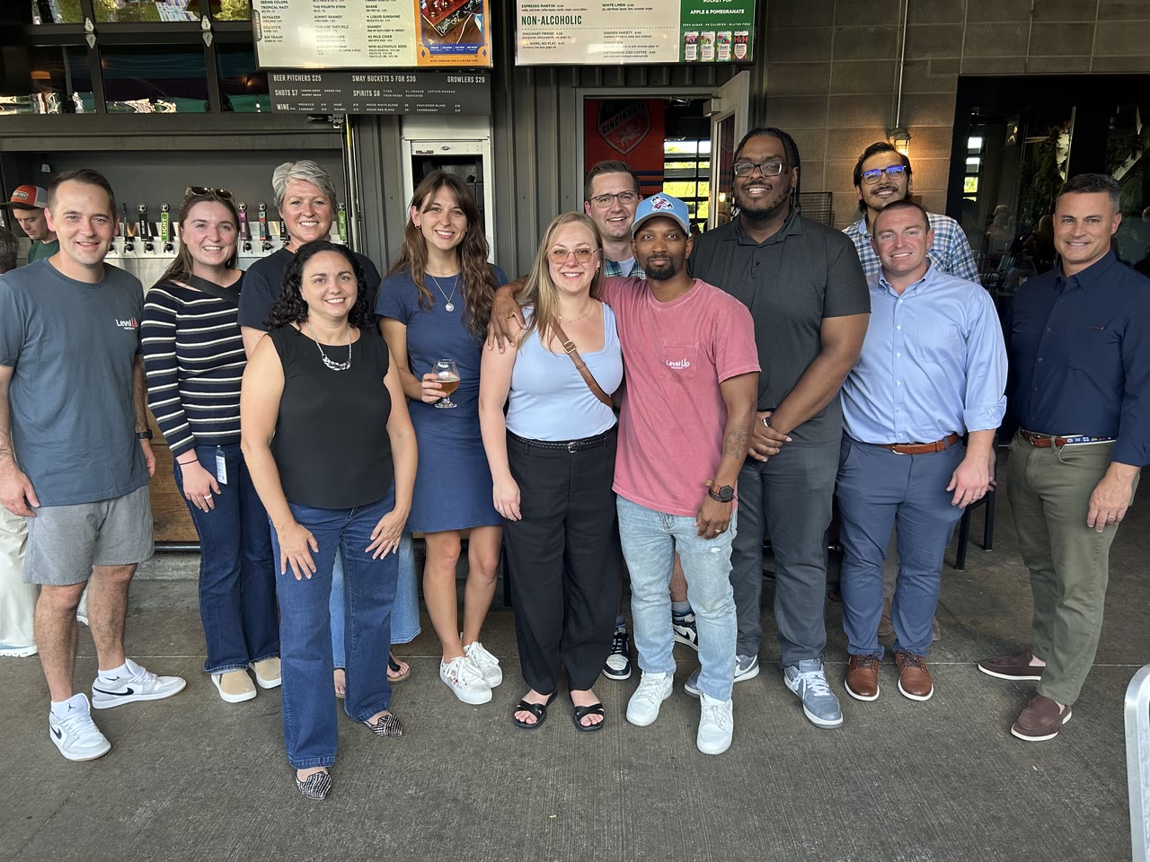 Level Up coaches gathered for a group photo at MadTree Brewing