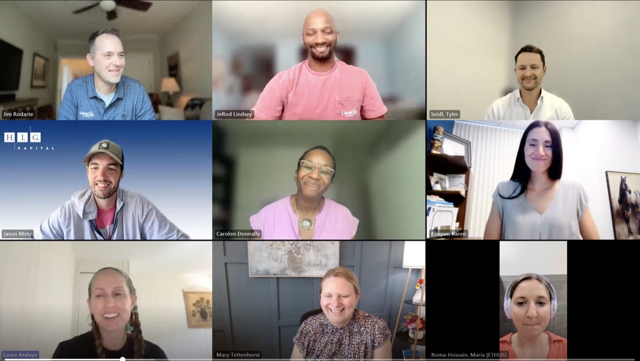 Nine smiling participants in a video call grid during Level Up Cincinnati's first virtual Coach Orientation